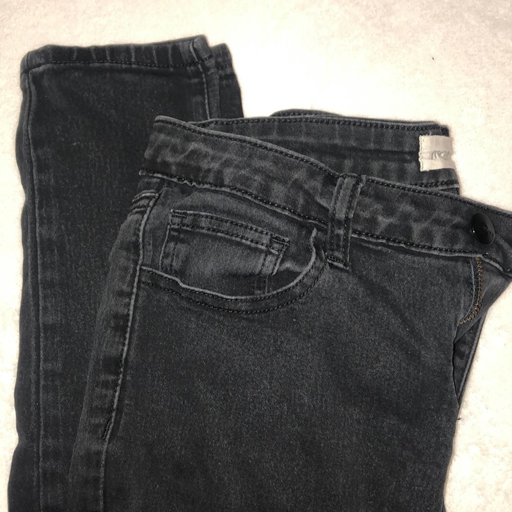Black Jeans with holes.